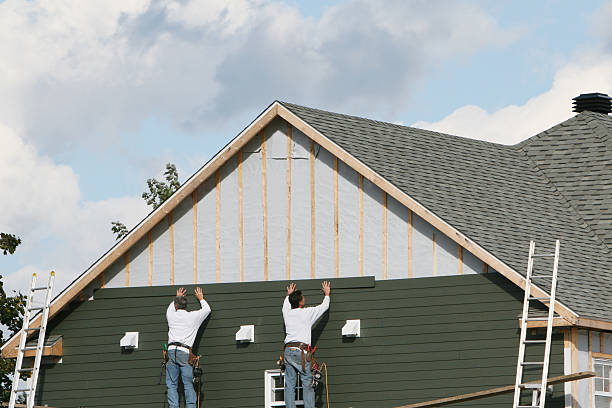 Professional Siding technician working in Hayes, VA
